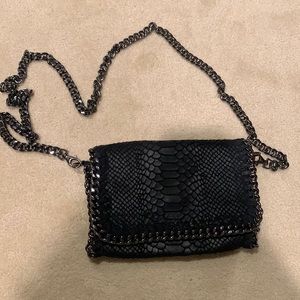 Crossbody 100% leather snakeskin black bag. Made it italy